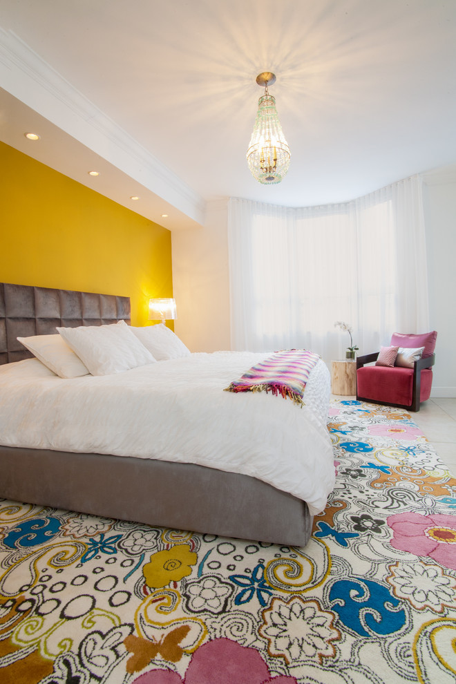 Trendy bedroom photo in Miami with yellow walls