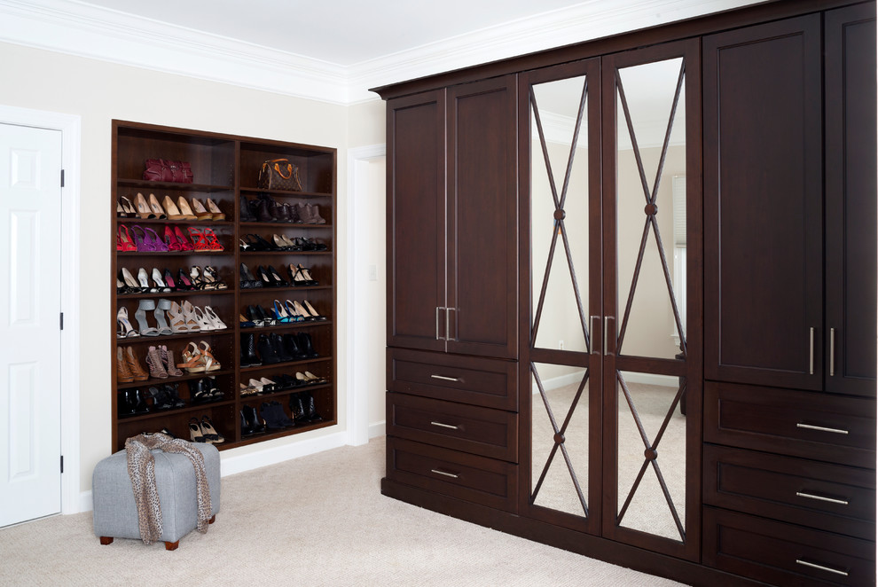Design ideas for a large classic wardrobe in DC Metro with carpet and beige floors.