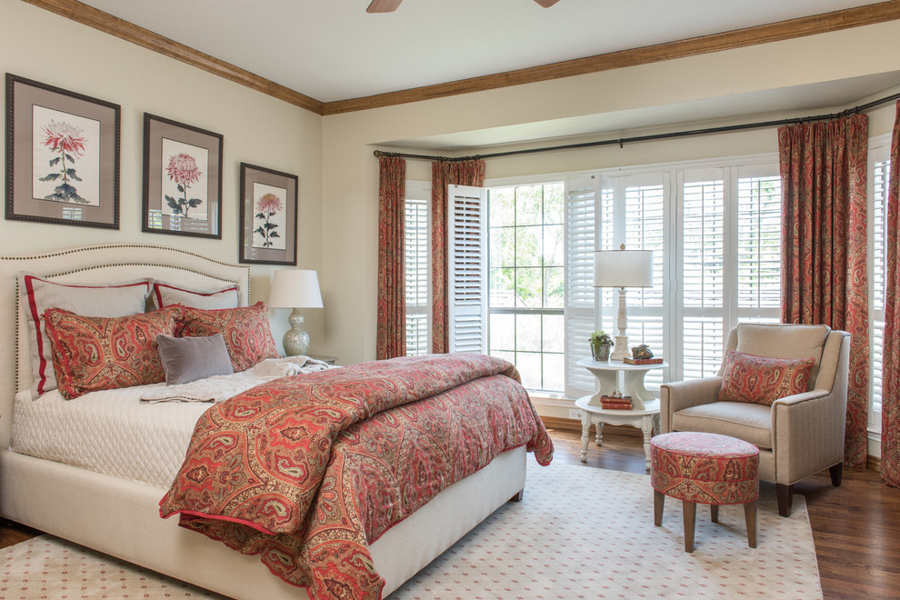Design ideas for a medium sized classic master bedroom in Dallas with beige walls and medium hardwood flooring.