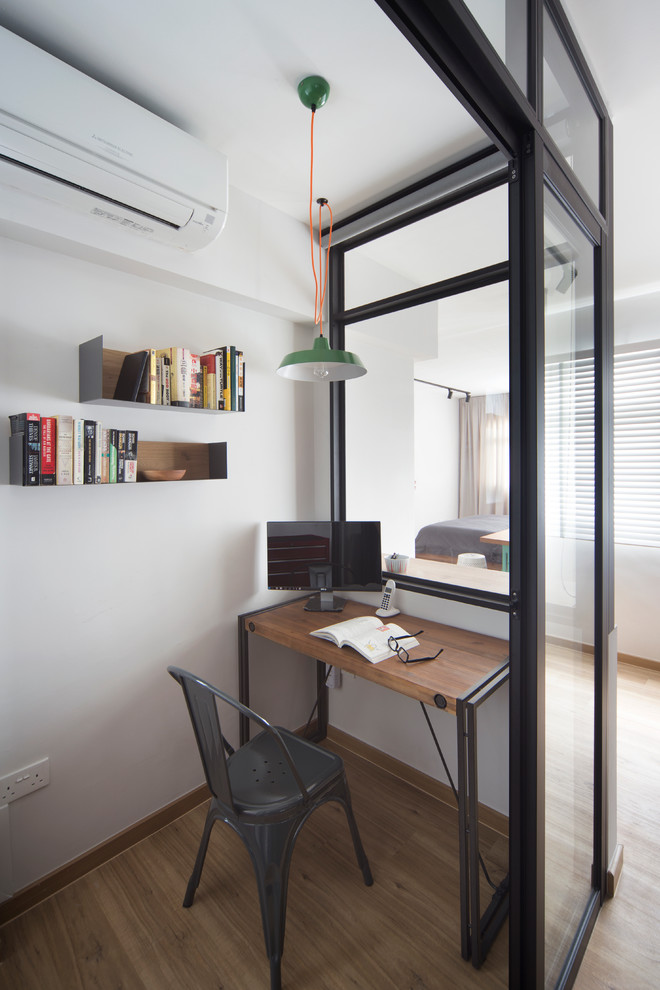 シンガポールにある北欧スタイルのおしゃれなホームオフィス・書斎の写真
