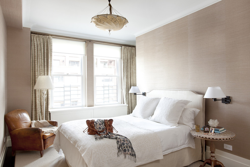 Trendy bedroom photo in New York with beige walls
