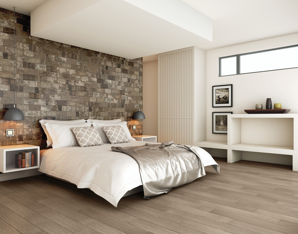 Exemple d'une grande chambre d'amis moderne avec un mur gris et un sol en carrelage de porcelaine.