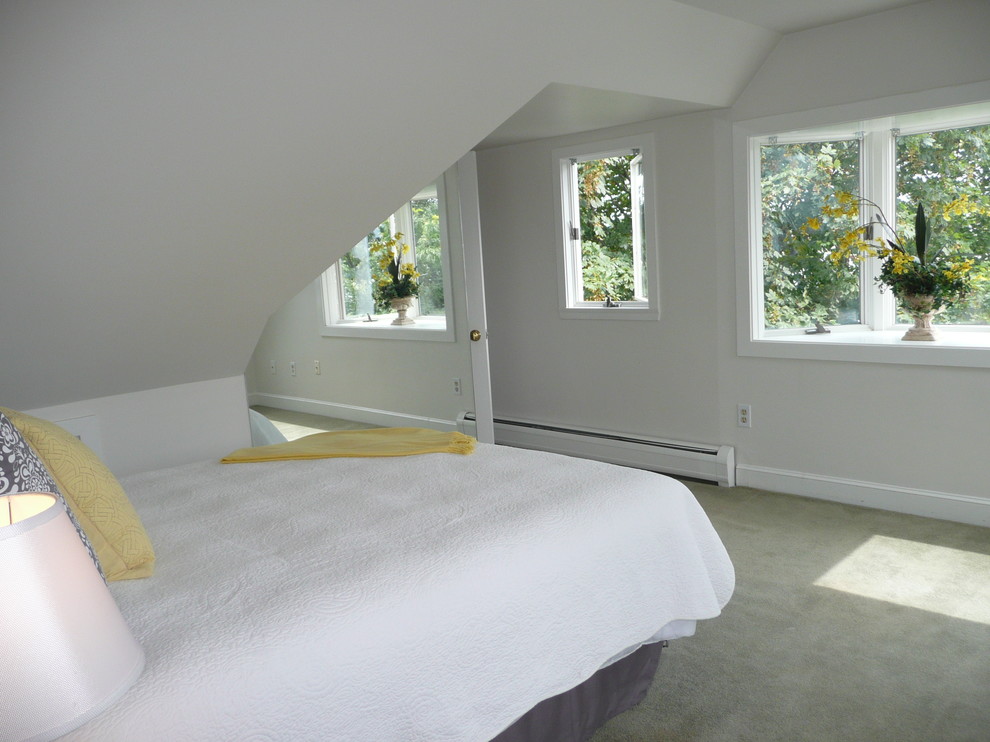 Photo of a small beach style mezzanine bedroom in Boston with white walls, carpet and no fireplace.