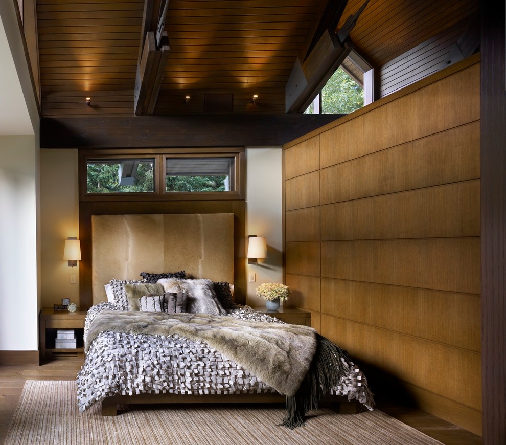 Design ideas for a contemporary bedroom in Vancouver with white walls and medium hardwood flooring.