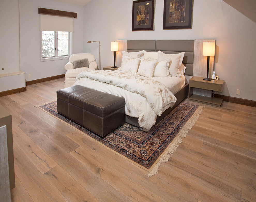 Bedroom - mid-sized contemporary master light wood floor bedroom idea in Denver with white walls and no fireplace