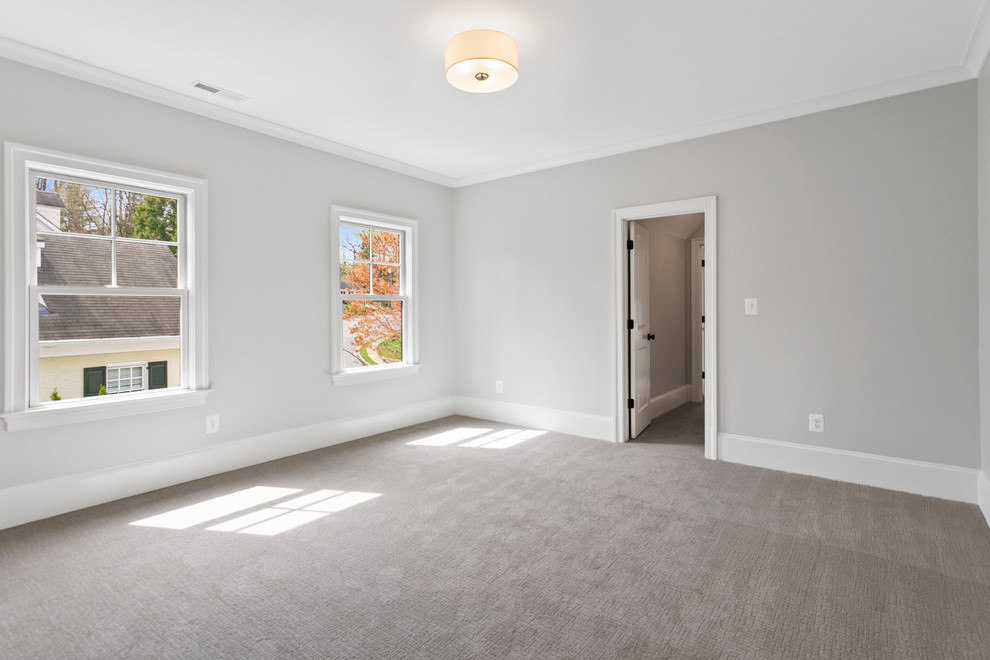 Foto de habitación de invitados actual de tamaño medio con paredes grises, moqueta y suelo gris