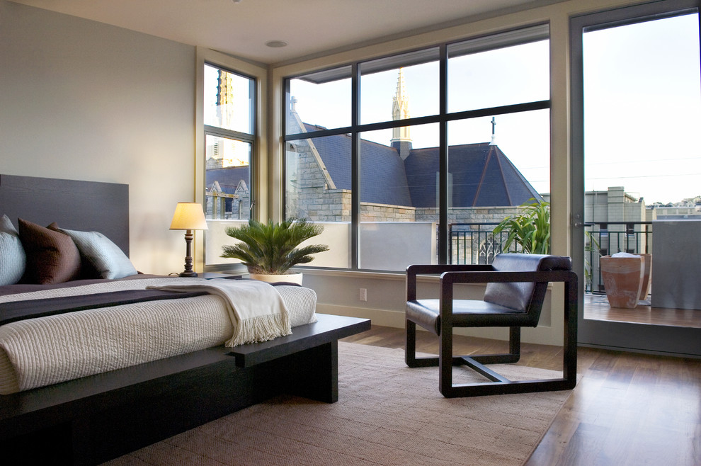 Photo of a contemporary bedroom in San Francisco with grey walls.