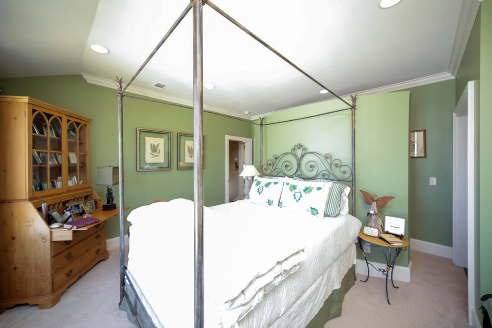 Medium sized country guest bedroom in Other with green walls, carpet, no fireplace and grey floors.