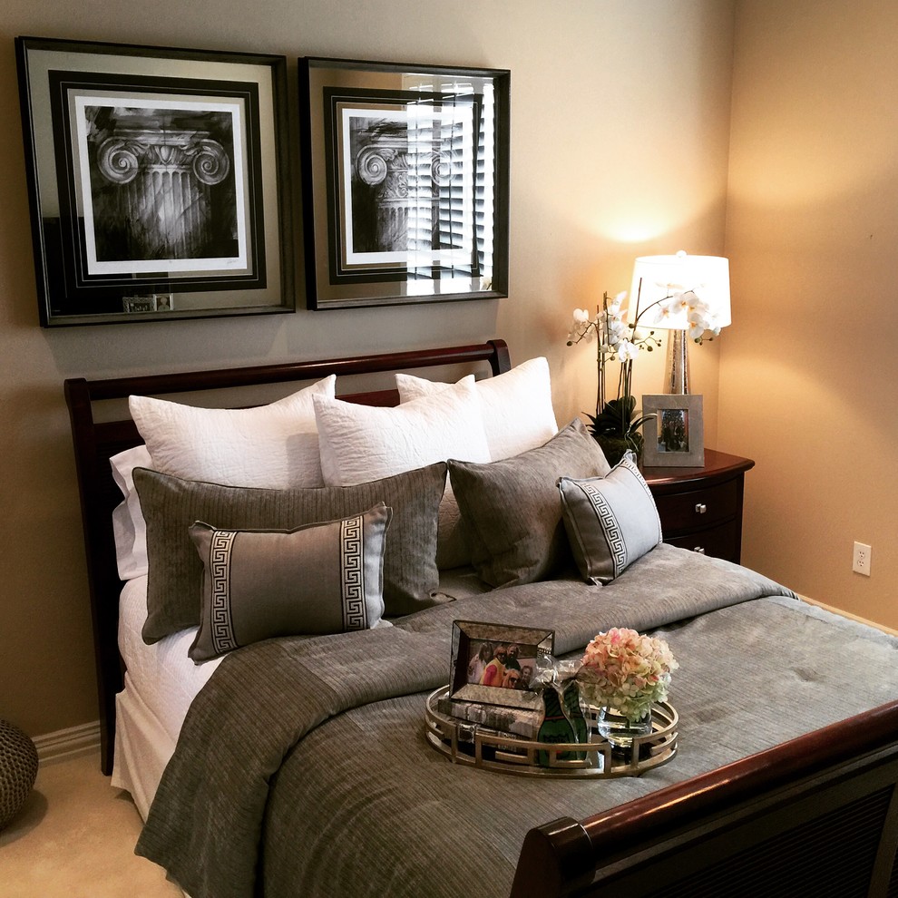 Photo of a medium sized traditional guest bedroom in Dallas with beige walls and carpet.
