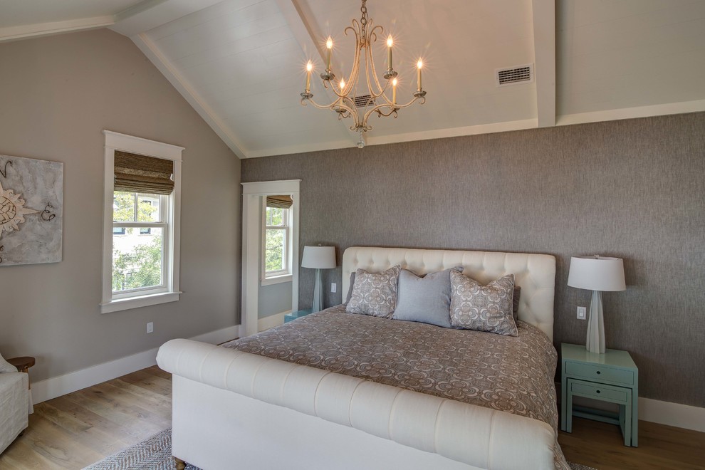 Bedroom - coastal master light wood floor bedroom idea in Atlanta with gray walls