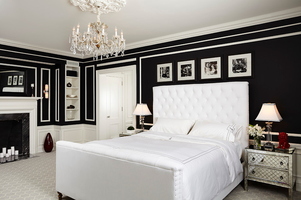 Example of a classic carpeted bedroom design in Minneapolis with black walls, a standard fireplace and a wood fireplace surround