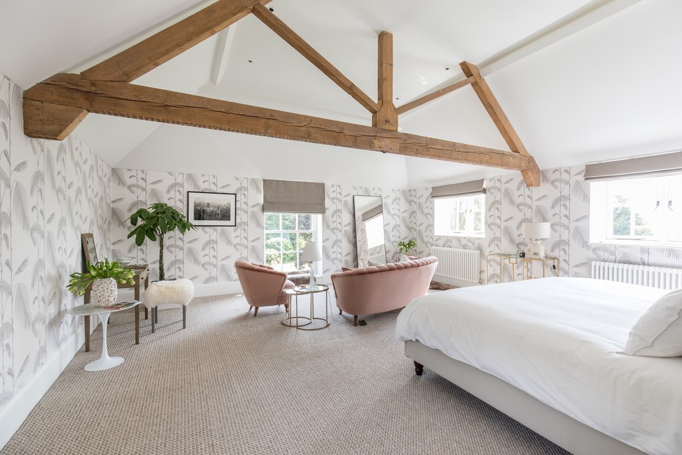 Large traditional master and grey and pink bedroom in Dorset with grey walls, carpet, no fireplace and beige floors.