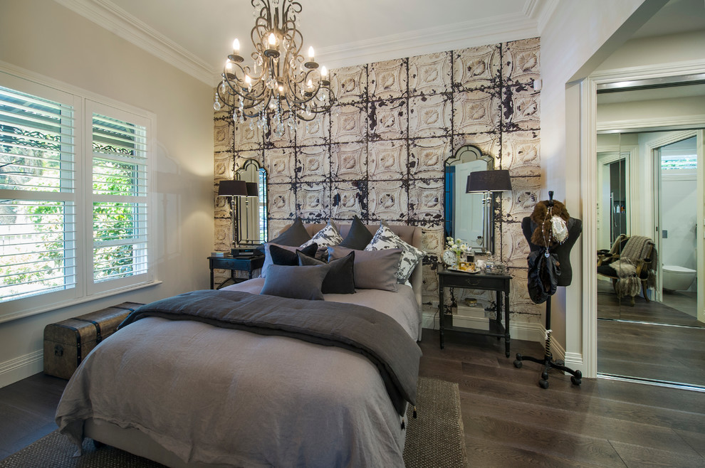 Example of a small ornate master medium tone wood floor bedroom design in Melbourne with white walls and no fireplace