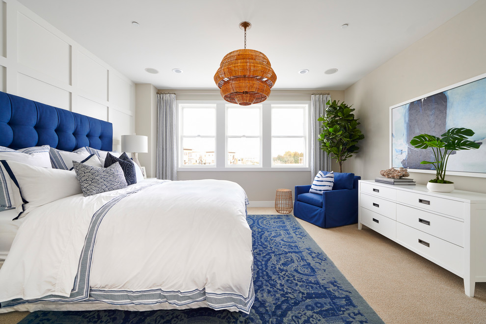Inspiration for a coastal carpeted and beige floor bedroom remodel in San Francisco with beige walls