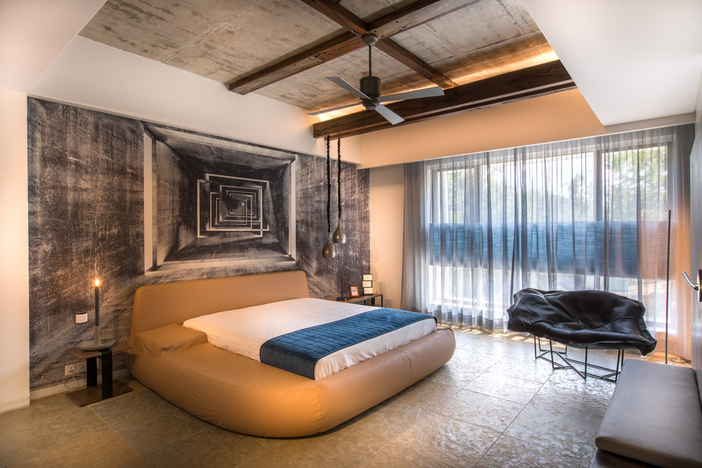 Esempio di una camera da letto minimal di medie dimensioni con pareti bianche e pavimento grigio