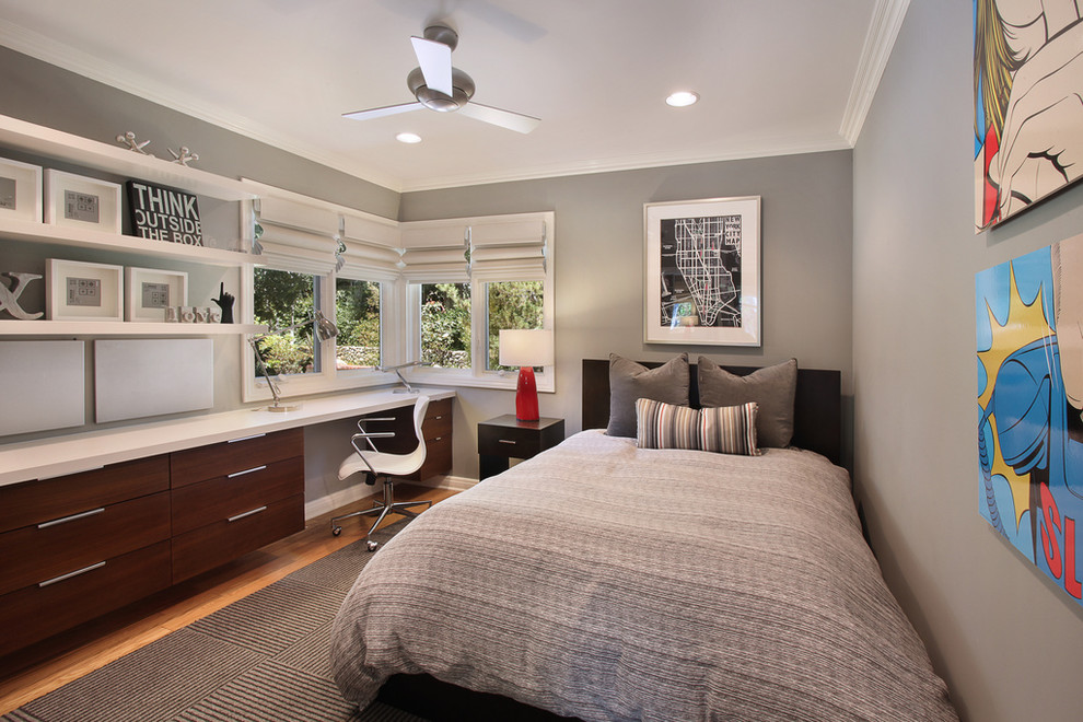 Trendy bedroom photo in Orange County with gray walls