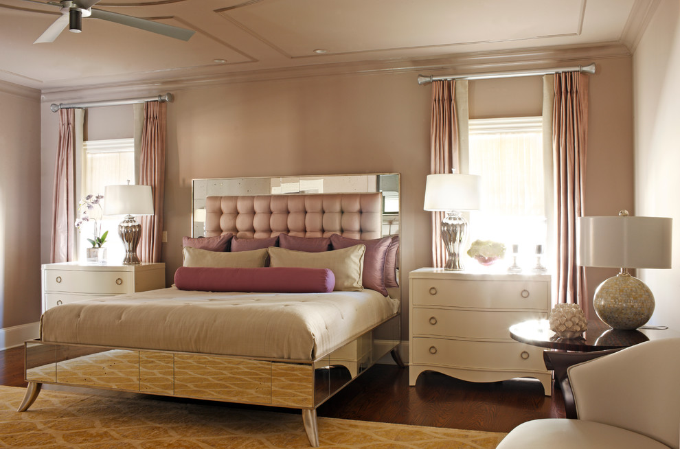 Inspiration for a large timeless master medium tone wood floor bedroom remodel in Atlanta with black walls