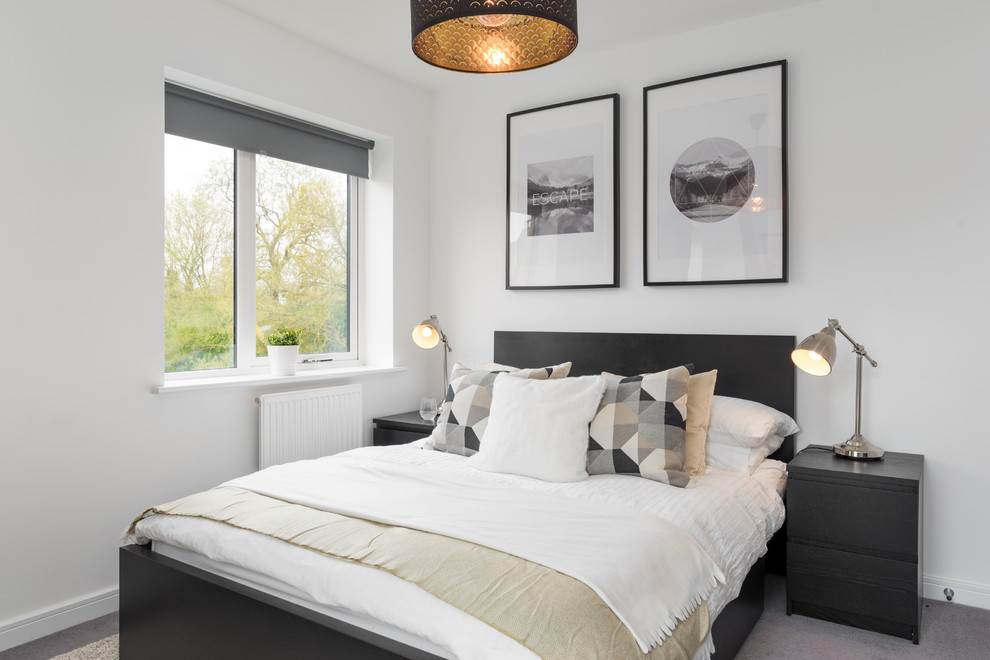 Diseño de habitación de invitados actual con paredes blancas, moqueta y suelo gris