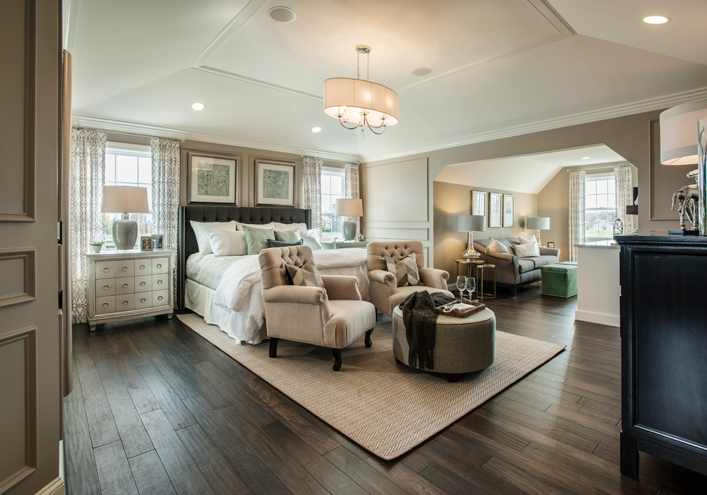 Photo of a large traditional master bedroom in Philadelphia with dark hardwood flooring, grey walls, no fireplace and feature lighting.