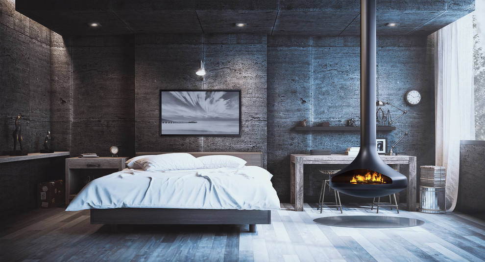 This is an example of a contemporary bedroom in Toronto with a hanging fireplace.