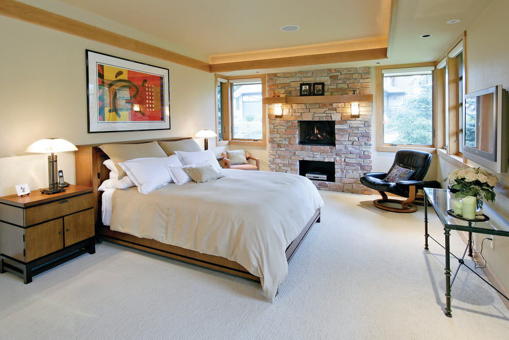 Example of a trendy carpeted bedroom design in Milwaukee with beige walls