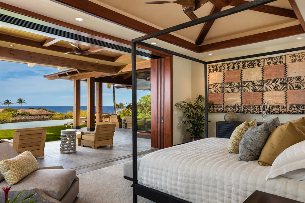 World-inspired bedroom in Hawaii with beige walls.