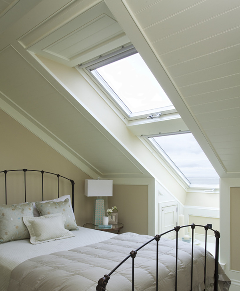 Inspiration for a timeless bedroom remodel in Dublin with beige walls