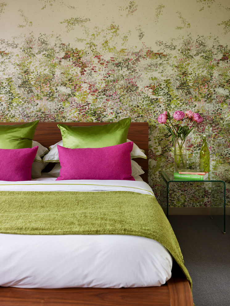 Trendy guest carpeted bedroom photo in London with no fireplace