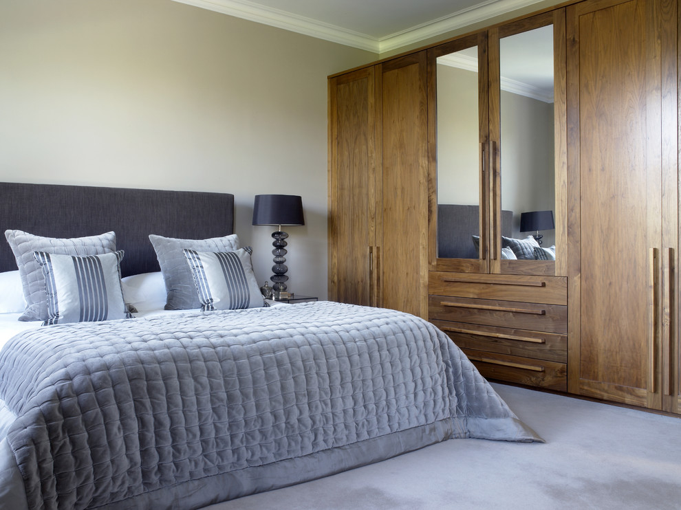 Example of a trendy bedroom design in London