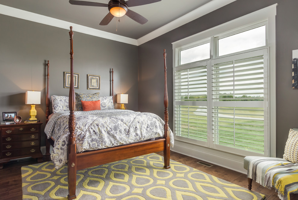 Mid-sized country master dark wood floor bedroom photo in Nashville with gray walls