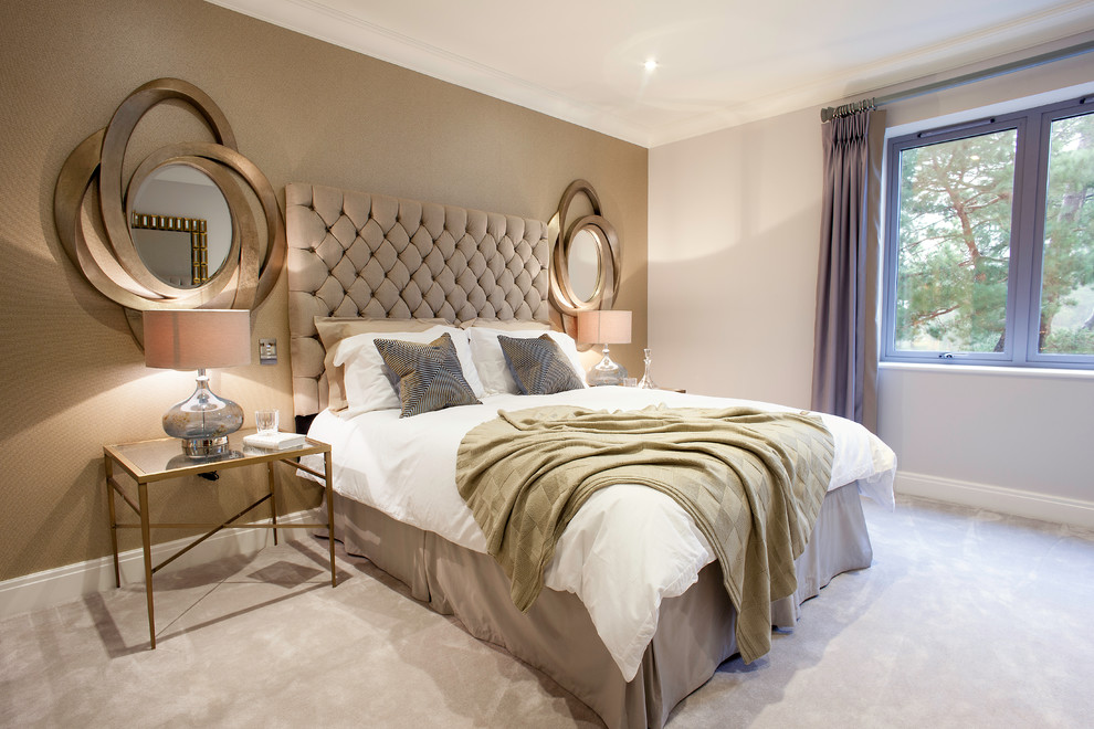 Contemporary grey and silver bedroom in Dorset with feature lighting.