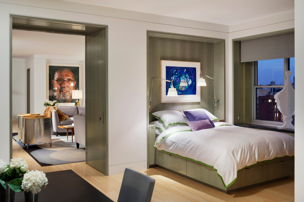 Example of a trendy bedroom design in New York with white walls