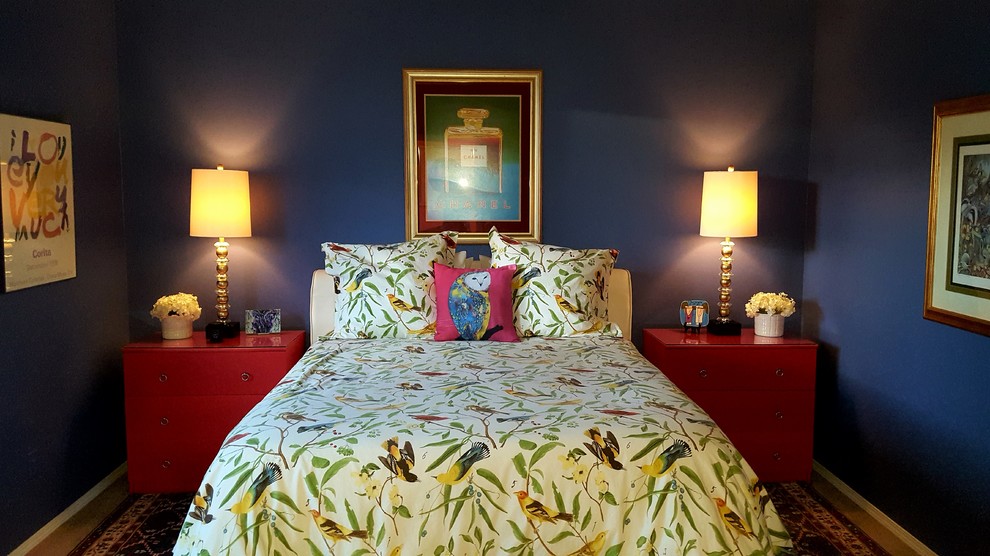 Example of a large transitional master carpeted and beige floor bedroom design in Portland with blue walls