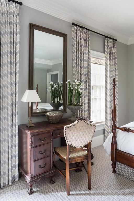Example of a mid-sized classic guest carpeted bedroom design in DC Metro with gray walls and no fireplace