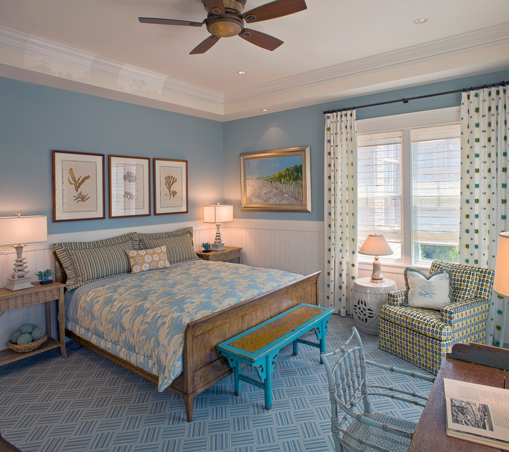 Inspiration for a beach style bedroom in DC Metro with blue walls and blue floors.