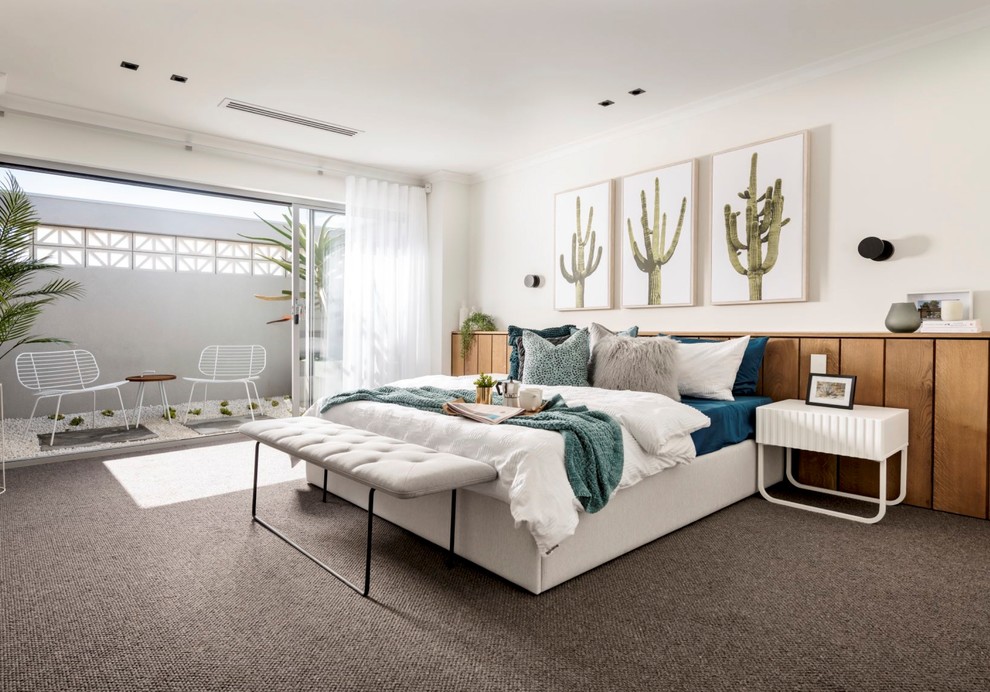 Inspiration for a contemporary master and grey and brown bedroom in Perth with white walls, carpet and brown floors.
