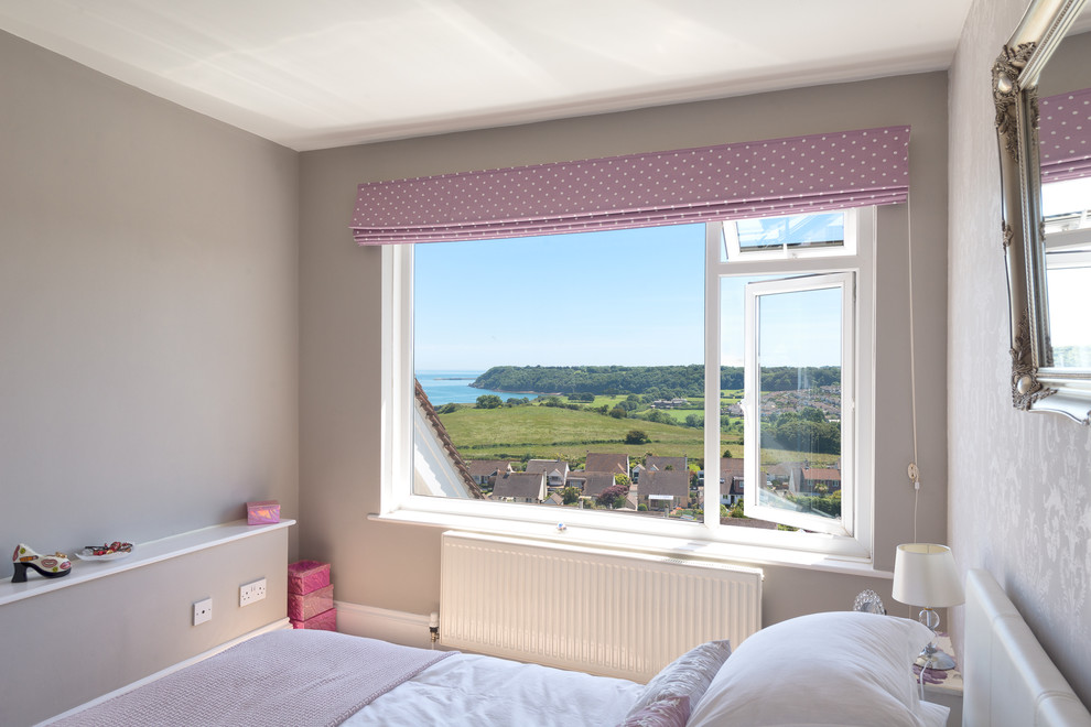 Inspiration for a medium sized beach style guest bedroom in Devon with grey walls and carpet.