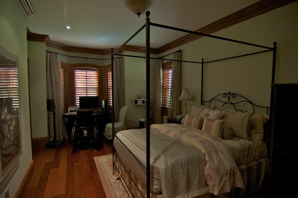 Inspiration for a victorian guest bedroom in Toronto with white walls and medium hardwood flooring.