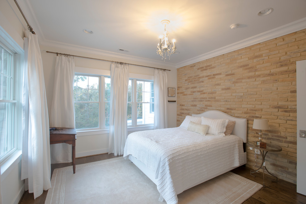 Example of a mid-sized transitional guest medium tone wood floor and brown floor bedroom design in Baltimore with white walls and no fireplace