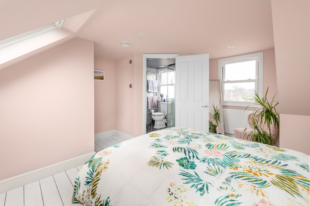 Idée de décoration pour une petite chambre minimaliste avec un mur rose.