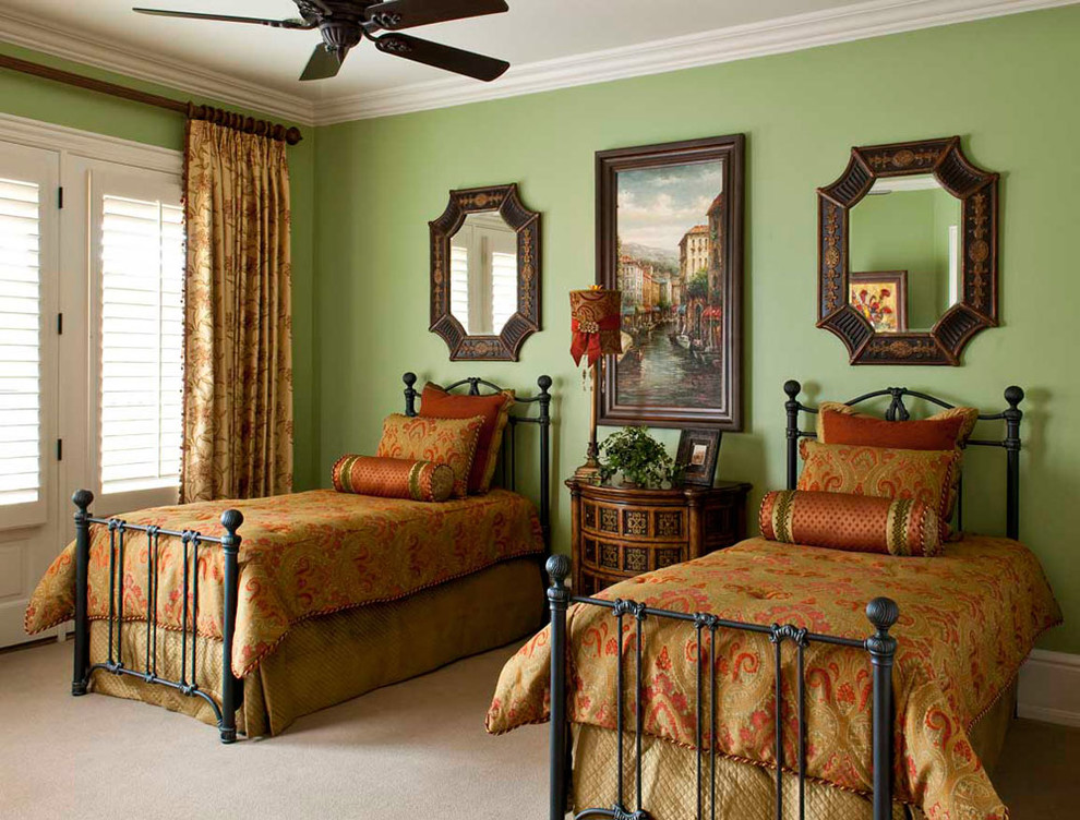 Mid-sized tuscan guest carpeted bedroom photo in Other with green walls