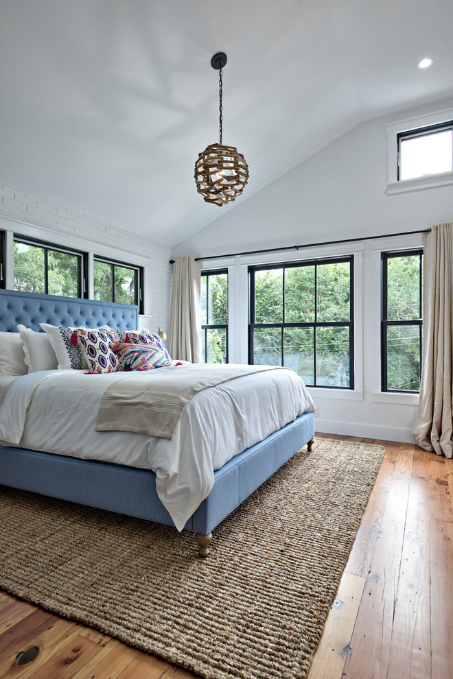 This is an example of a farmhouse bedroom in Austin.