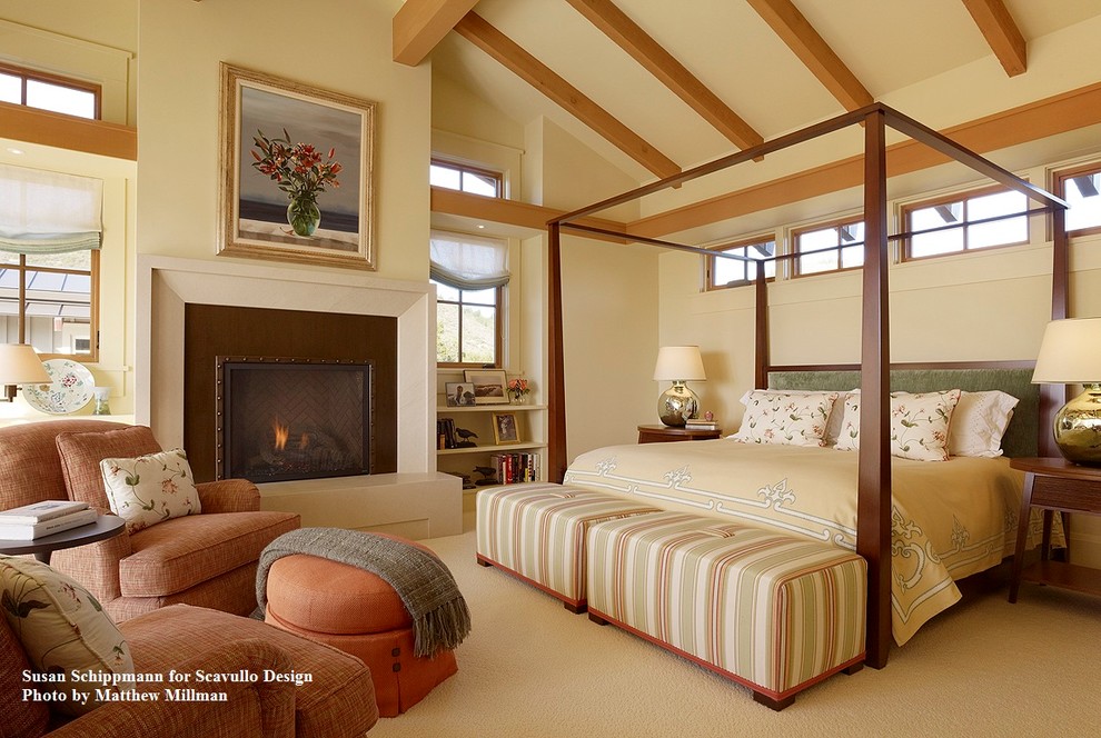Bedroom - mid-sized traditional master carpeted bedroom idea in San Francisco with beige walls and a metal fireplace