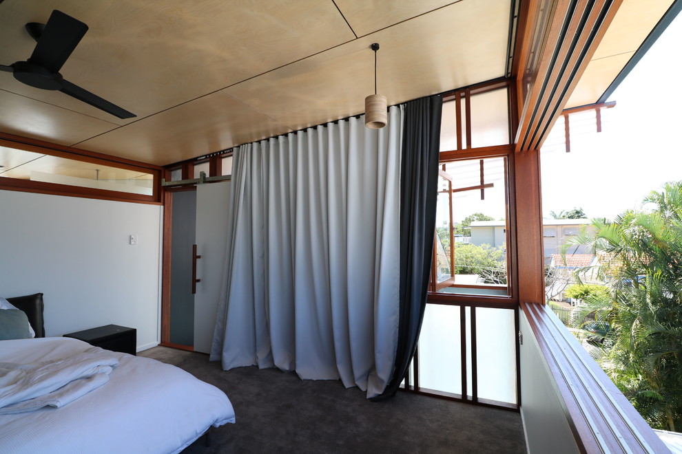 Contemporary bedroom in Brisbane.