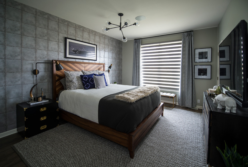 Exemple d'une chambre parentale tendance de taille moyenne avec un mur gris, un sol en vinyl et un sol marron.