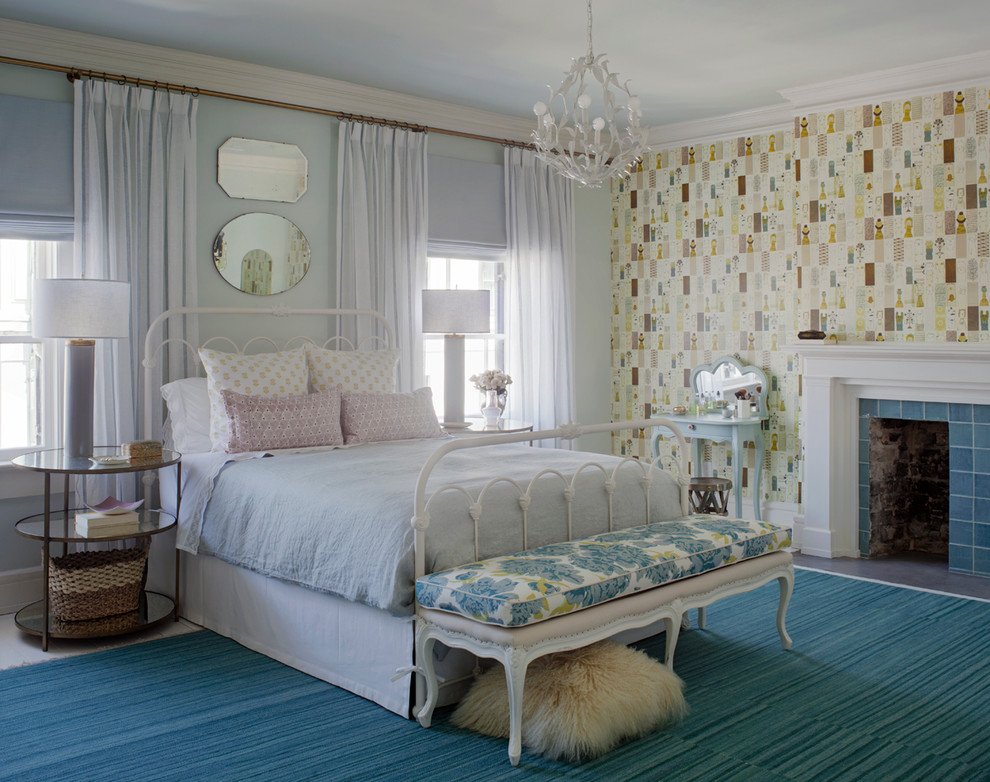 Example of a mid-sized trendy guest carpeted bedroom design in Atlanta with multicolored walls, a standard fireplace and a tile fireplace