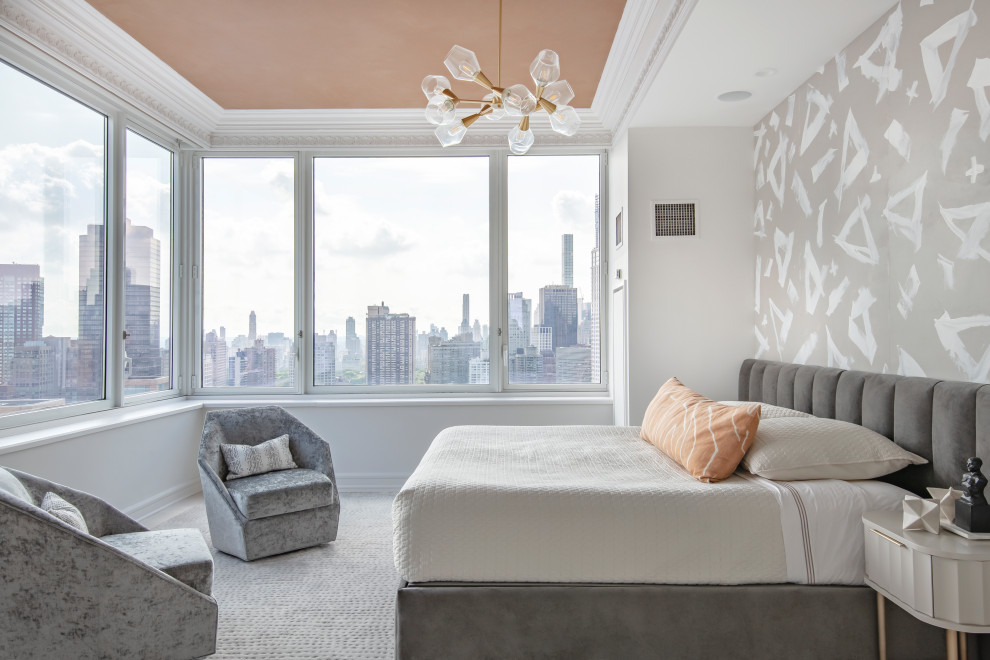 Trendy carpeted and gray floor bedroom photo in New York with gray walls