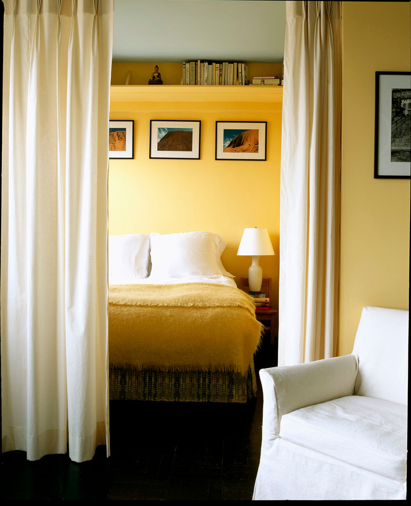 Example of a trendy bedroom design in New York with yellow walls