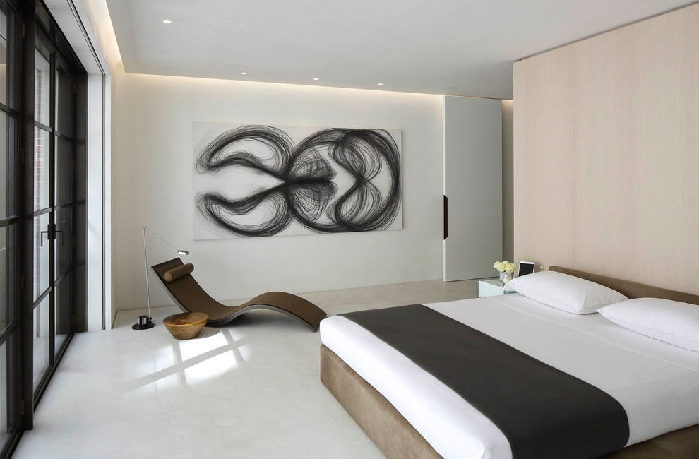 Inspiration for a modern master concrete floor bedroom remodel in New York with white walls