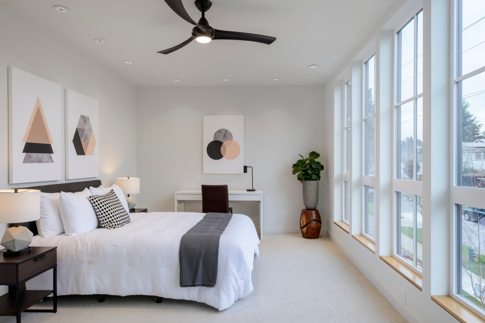 シアトルにある広いコンテンポラリースタイルのおしゃれな客用寝室 (白い壁、カーペット敷き、白い床)